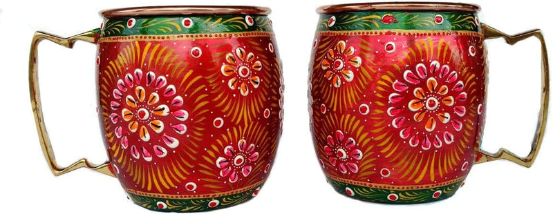 A Red Pair Of Copper Mugs With Hand Painted Outer For Juice, And Cold Coffee