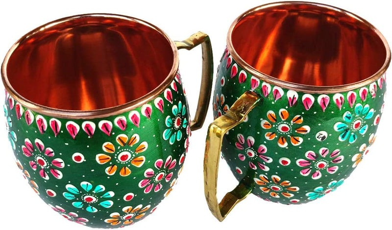 A Green Pair Of Handmade Copper Mugs Alongside Outer Painted For Cocktail Or Juice